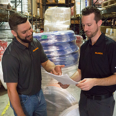 Moore Supply Co. employee working in a store